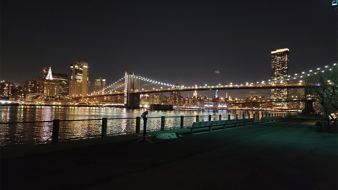 Photo of the Brooklyn Bridge and New York City Skyline at Night